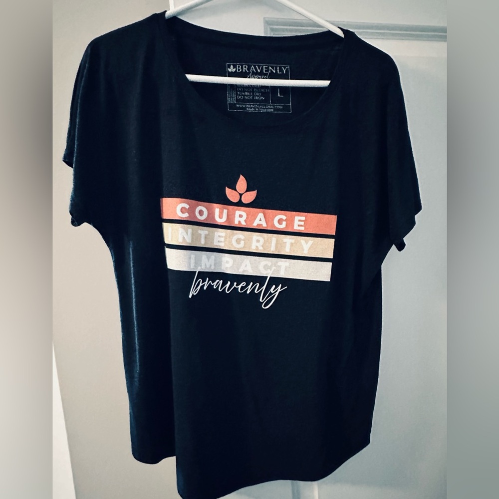 Bravenly shirt, courage, integrity, impact. Excellent condition like new.